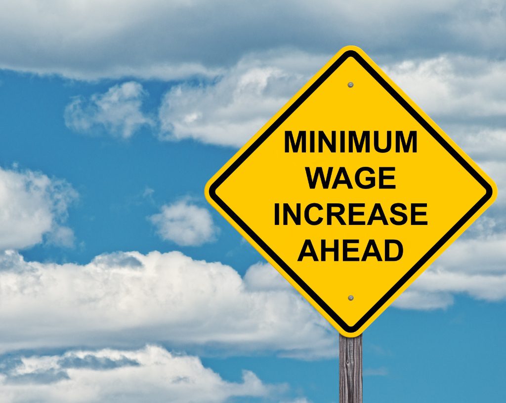 Minimum wage increase on sign
